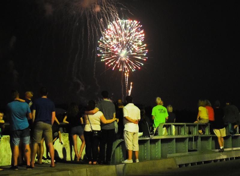 Folks gather on the Savannah Road drawbridge to watch the fireworks. NICK ROTH PHOTOS