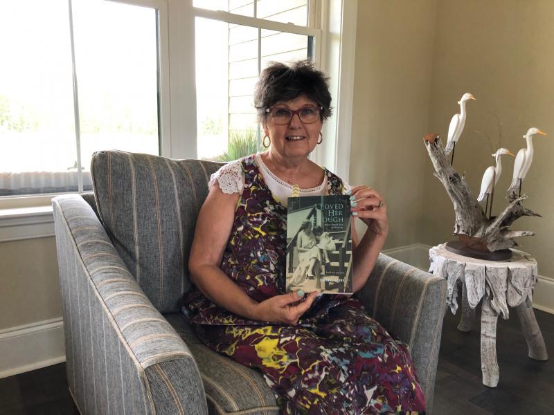 Author and Lewes resident Diane Lane holds her book, “I Loved Her Enough.” A native of Harrington, Lane recently did her first book signing at Browseabout Books. RYAN MAVITY PHOTOS