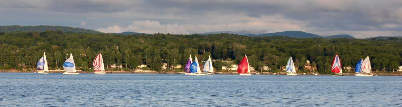 The racing fleet, strung out on Shelburne Bay with Vermont’s Green Mountains in the background. We’re just about 500 miles north of Lewes. DENNIS FORNEY PHOTOS
