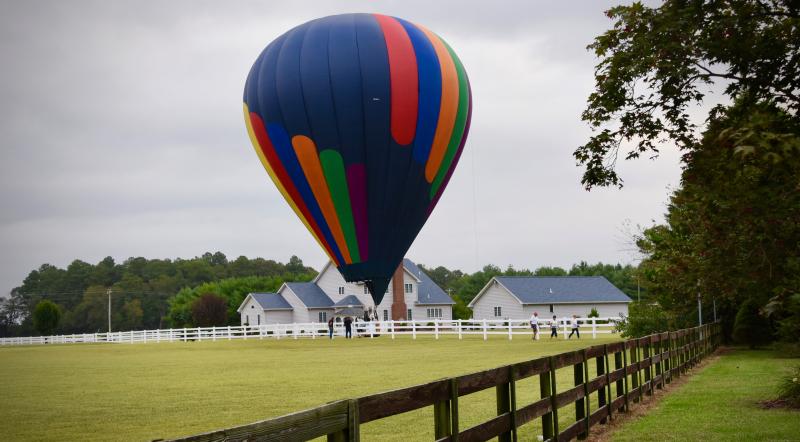 The Tailwinds Over Frederick team from Frederick, Md. has to land in a horse pasture off Gravel Hill Road near Georgetown.