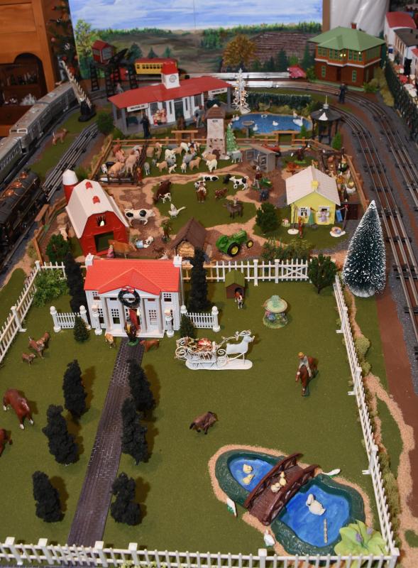 The farm animals and buildings in this train set date back to Cathy Tydings’ childhood.