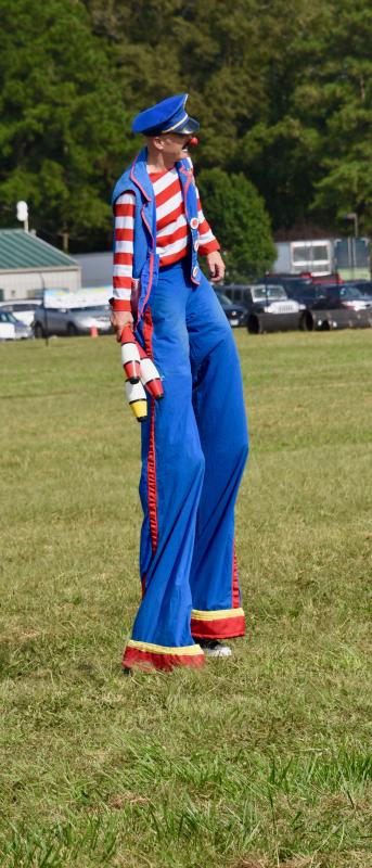 Officer Offbeat scopes out the festival grounds.