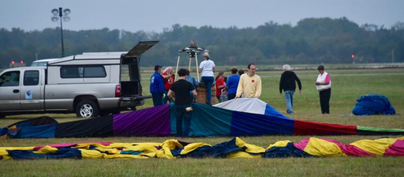 Teams get their balloons ready for early-morning flights on Sept. 15.