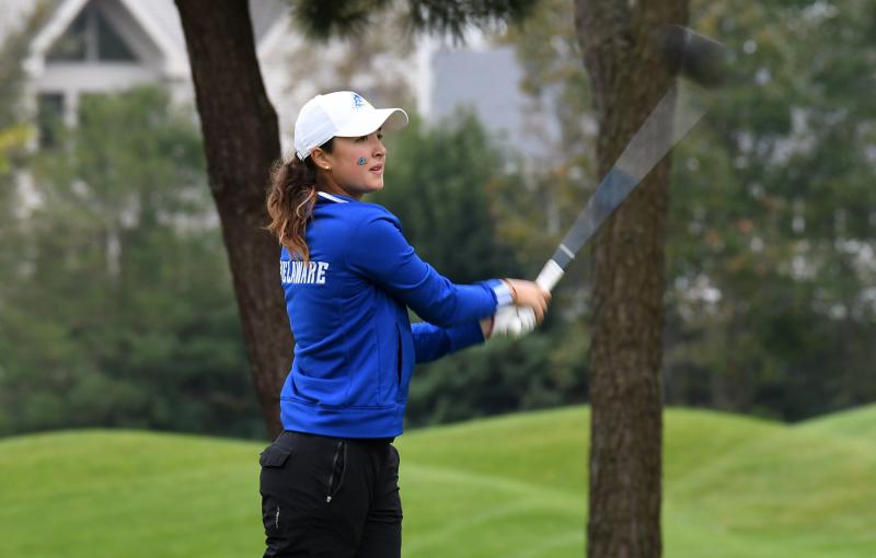 University of Delaware junior Josefina Fernandez-Davila from Lima, Peru, watches as her drive moves down the fairway at last year’s Blue Hen Invitational. DAN COOK PHOTOS
