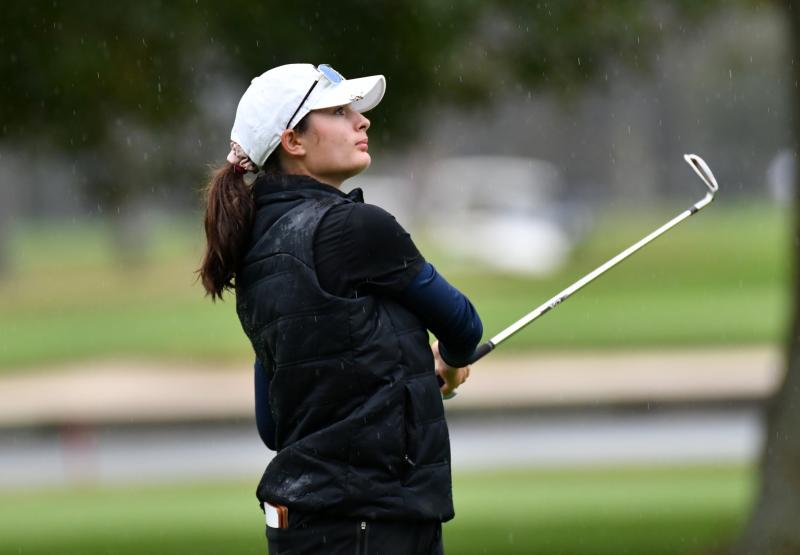 Lauren May from Georgetown University watches as her fairway shot makes it to the green.