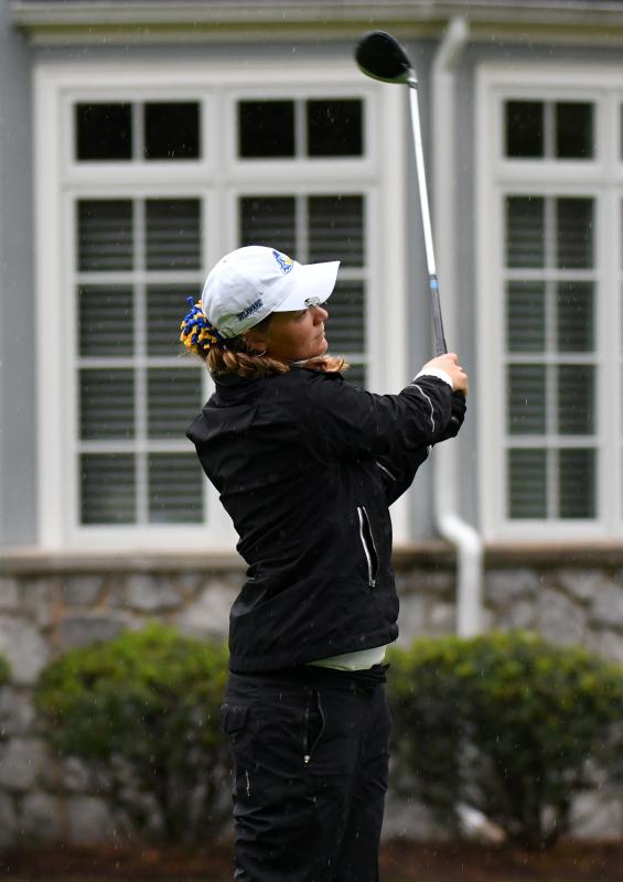 Ariane Klotz from the University of Delaware hits from the fairway.
