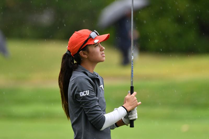 Lauryn Pritchard from Oklahoma City University watches her fairway shot.