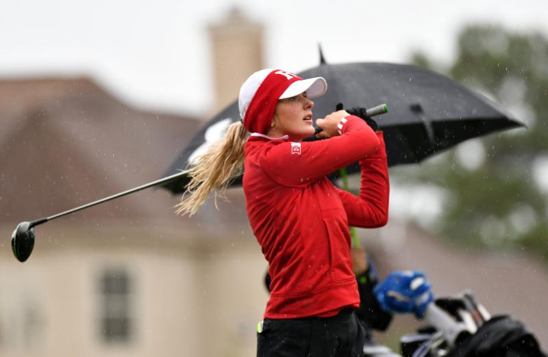 Anna-Maria Diederichs of Rutgers slams a fairway shot.