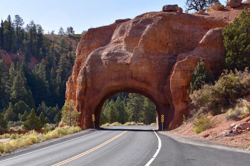 One of two small tunnels drilled through the rock in Red Canyon.