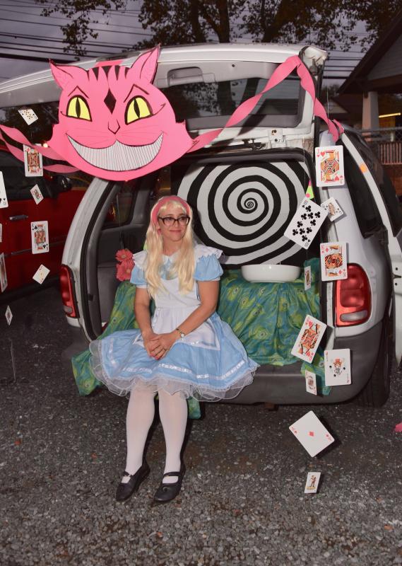 Holly Piper-Smith is ready for trick-or-treaters, dressed as Alice in Wonderland at the Sussex Family YMCA Trunk-or-Treat. RON MACARTHUR PHOTO