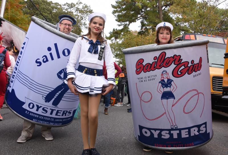 Dressed as oyster cans are (l-r) Kim, Madeline and Tony Newman of Lancaster, Pa. RON MACARTHUR PHOTO