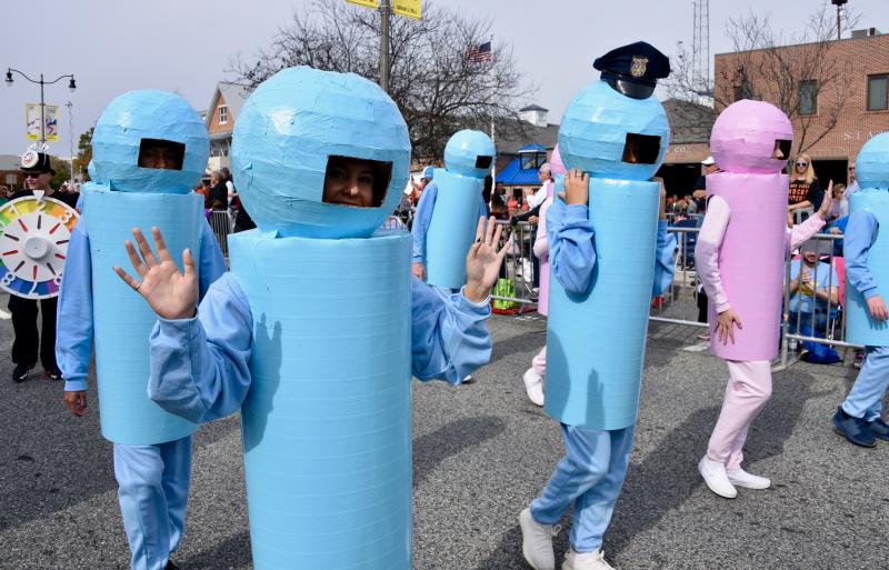 Pieces from The Game of Life march along the parade route. RON MACARTHUR PHOTO