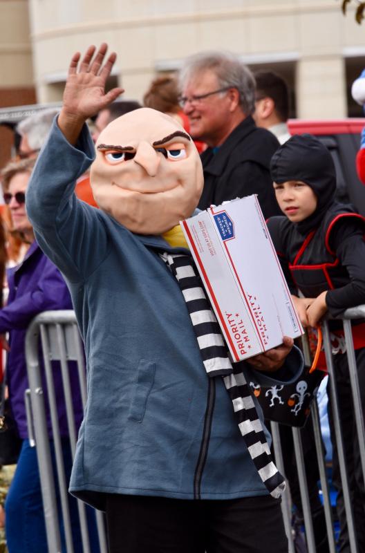 Dressed as Gru of movie “Despicable Me” fame, a U.S. Postal Service employee has a special delivery. RON MACARTHUR PHOTO