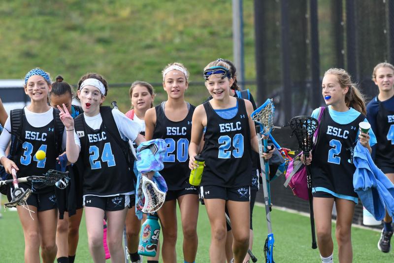Players from the Eastern Shore Lacrosse Club 2025 team leave the field happy after 5-5 tie versus Lady Belles. Shown are (l-r) Skylar Steigerwalt, Korie Glenn, Bailey Masten, Lina Frederick and Sophia Massaro. DAVE FREDERICK PHOTOS