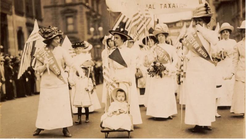 Suffragists march through the streets in the early 20th century. NATIONAL ARCHIVES PHOTO