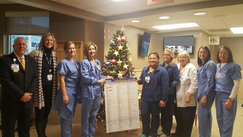 Gathered at the Holiday of Life tree at the Margaret H. Rollins Lewes Campus are (l-r) Thomas J. Protack, vice president of development, Beebe Medical Foundation; Bridget Buckaloo, Women’s and Children’s Health Services executive director; Anna Merrick, RN; Jen Horner, RN; Lydia Martin, RN; Cassie Reed, RN; Lisa Klein, DNP; Amanda Biro, RN; and Celia D’Orazio, RN. SUBMITTED PHOTO