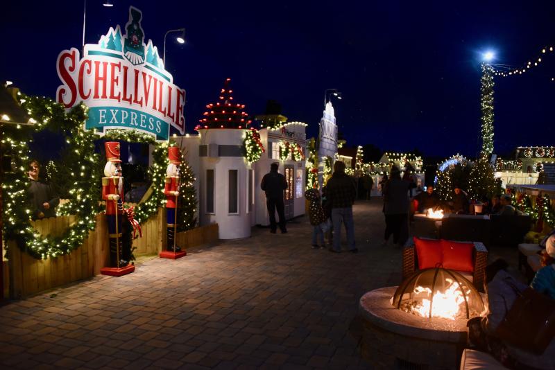 A paved walkway leads visitors around the miniature buildings in Schellville Christmas Village.