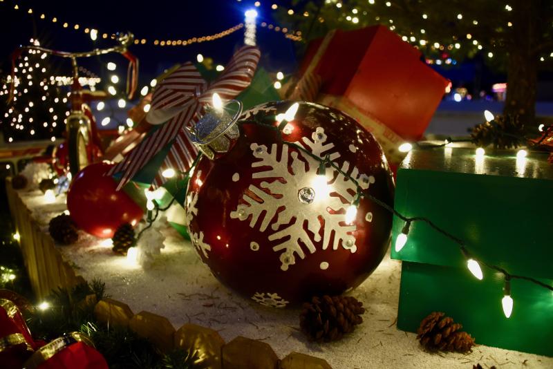 A larger-than-life Christmas ornament is among the colorful holiday displays throughout Winter Wonderfest.