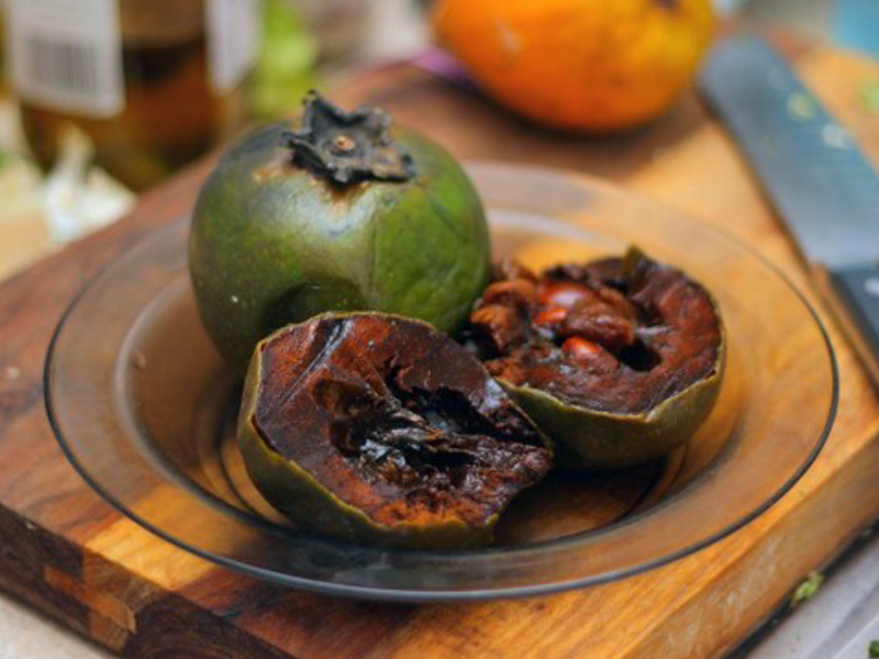 After the fruit ripens, slice it in half and scoop out the rich, dark-brown pulp that really does taste like chocolate pudding. SUBMITTED PHOTO