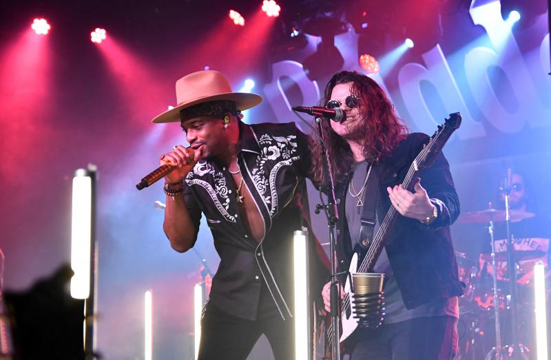 Jimmie Allen and band member Tate Howell team up on a song.