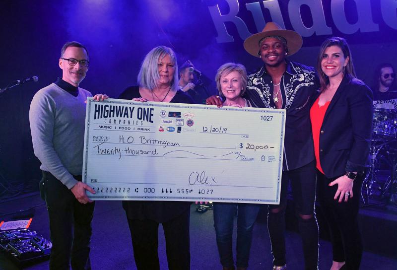 Cape grad Jimmie Allen raised $20,000 for the H. O. Brittingham Elementary School in concerts at the Rusty Rudder in Dewey Beach Dec. 20-21. Shown are (l-r) HOB Principal Ned Gladfelter, Highway One Events Coordinator Vikki Walls, HOB reading specialist Cathy Miller and Cape board member Jessica Tyndall. DAN COOK PHOTOS