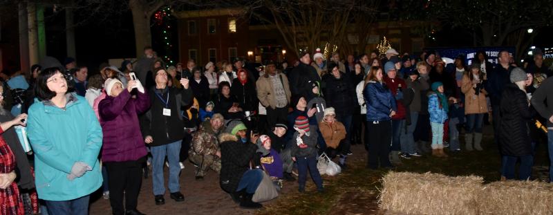 A large crowd gathers to view the living nativity in downtown Georgetown.