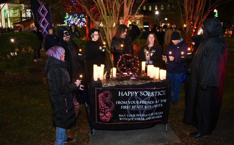 The First State Satanists gather on The Circle to celebrate the winter solstice. RON MACARTHUR PHOTOS