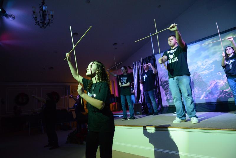 The Youth Stick Ministry performs to “My Feet Are on the Rock,” revealing the scriptural foundations upon which Timothy was made wise. New Covenant Shadow