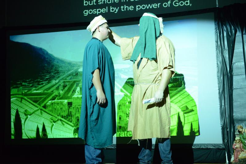 Paul, played by Mathew Evins, delivers the hard copy of his letter and tells Timothy to pass it on. New Covenant Shadow