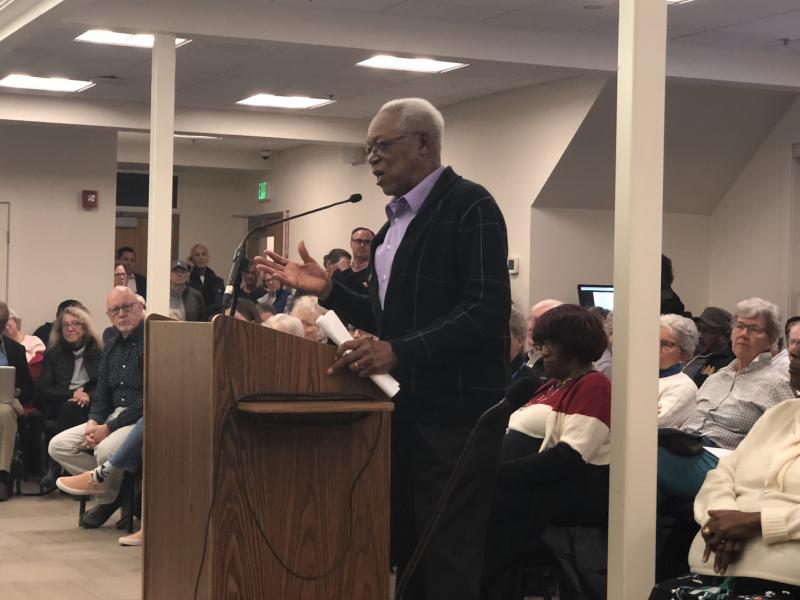 The Rev. George Edwards thanks mayor and city council for the honorific renaming of West Fourth Street. NICK ROTH PHOTO