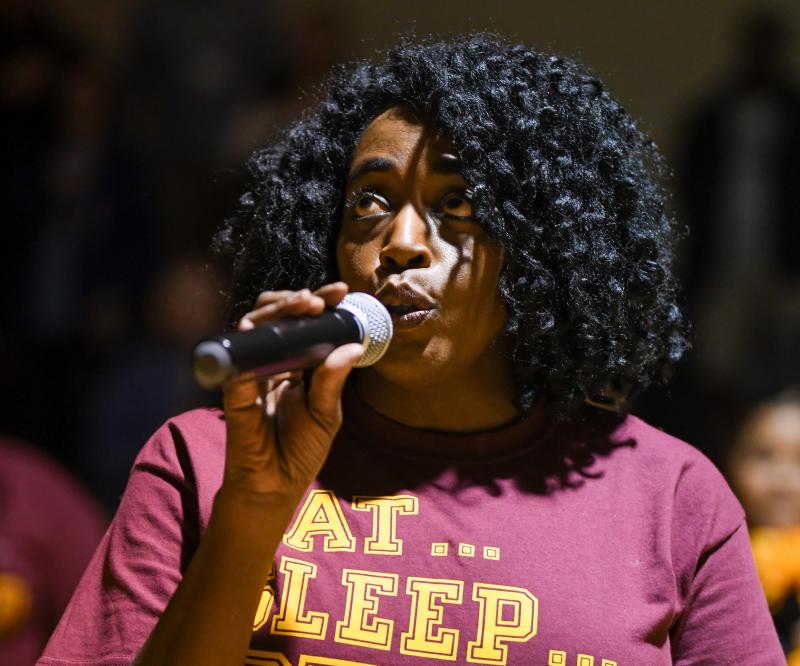 Myrna Sturgis Shockley sings the national anthem. DAVE FREDERICK PHOTO