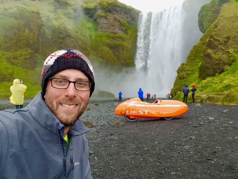 John Duffy stops at a popular tourist destination, a waterfall in Skøgafoss, Iceland.