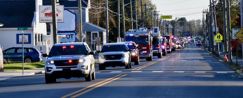 Lewes police lead the procession of first responders along Savannah Road. RON MACARTHUR PHOTO