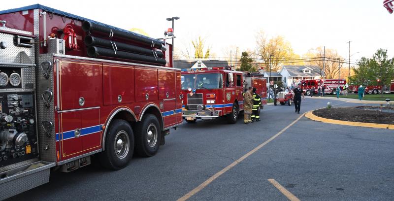 Fire trucks line up around Beebe Healthcare during an April 9 tribute. RON MACARTHUR PHOTO