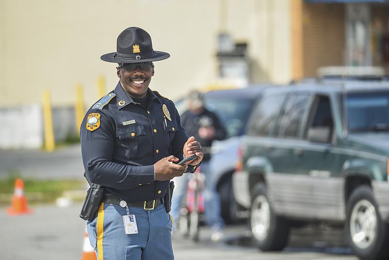 Milton Police Capt. Derrick Harvey keeps the peace at the municipal lot in Milton.