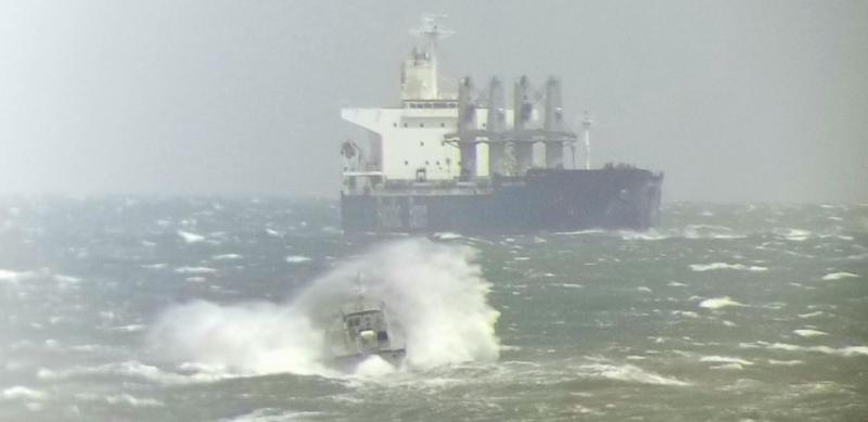 This shot from the pilot tower in Lewes shows a pilot boat taking a captain to his ship. Jesse Billings and Mike Newsham head to the ship to pick up pilot Michael Potter RICK YAKIMOWICZ PHOTO
