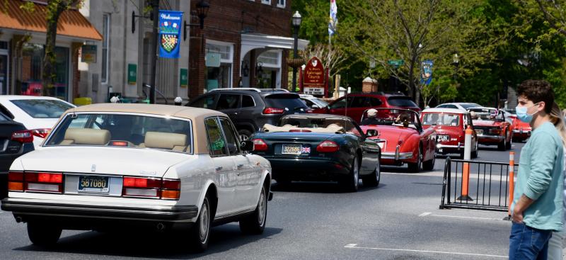 British cars traverse a nearly empty Second Street in downtown Lewes.