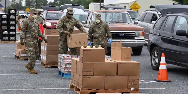 Boxes of food are piled high during the second mass distribution in Sussex County.
