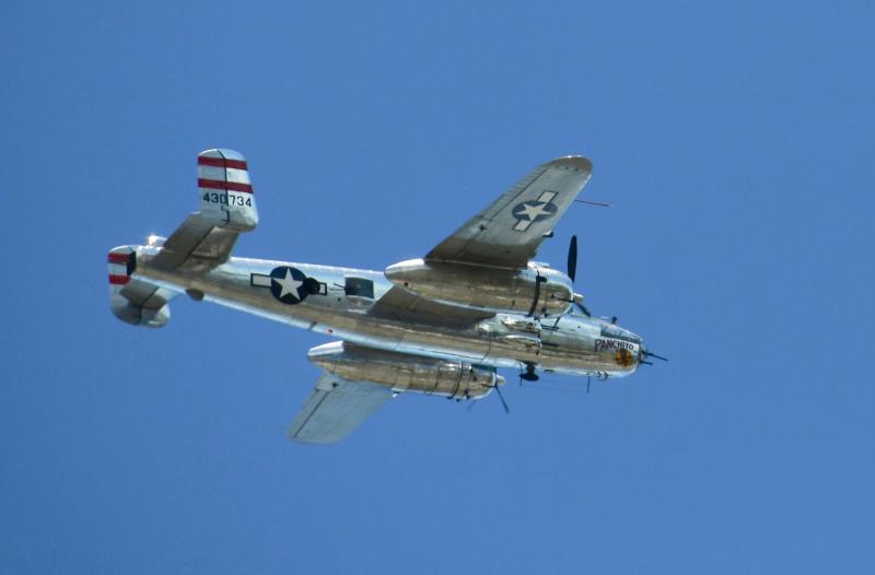 B-25 Panchito flies over healthcare and first responder locations in Lewes.