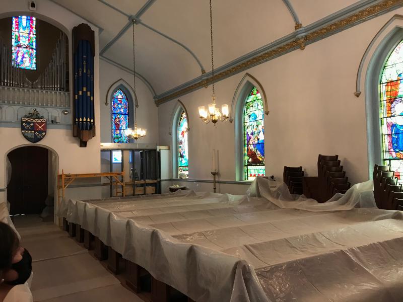Pews are covered to protect them from dust and debris as crews work to finish the upgrades.