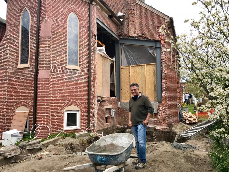 Mark Chura of Chura and Associates stands outside the Third Street side of St. Peter’s, where a new entrance and addition are being built.