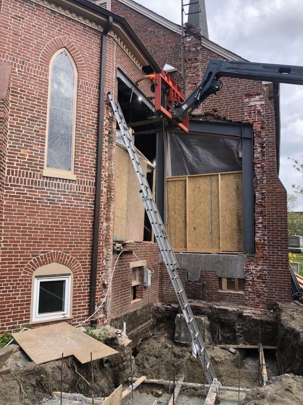Steel beams support a part of the church that was structural unsound.