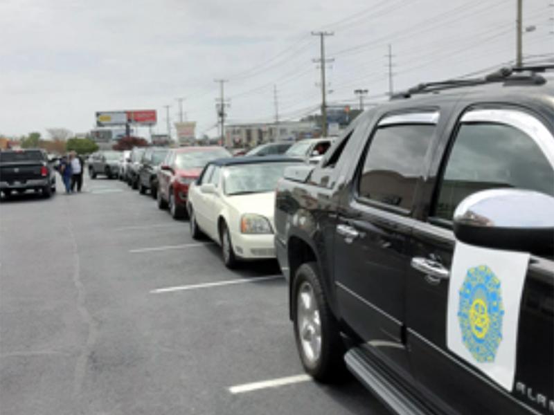 American Legion Post 17 family members line up in a caravan to drive by a member’s home to offer get well wishes and messages of cheer. SUBMITTED PHOTO