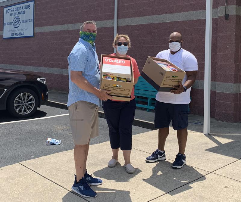 Gathered at the Oak Orchard Boys & Girls Club are (l-r) President John Berner, Long Neck Sunrise Rotary Club; Erica Kennedy, Oak Orchard Boys & Girls Club director; and Demaris Miller, Rehoboth Beach Boys & Girls Club director. SUBMITTED PHOTO