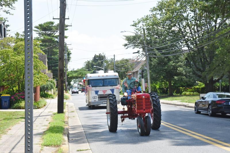A tractor joins the parade.
