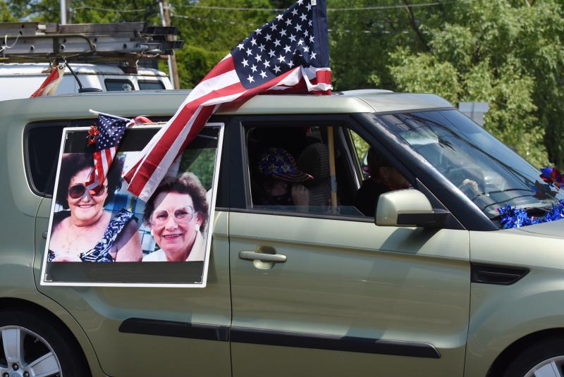 Carolyn Shockley and Phyllis Hoenen are honored during the annual parade they started in the 1960s.