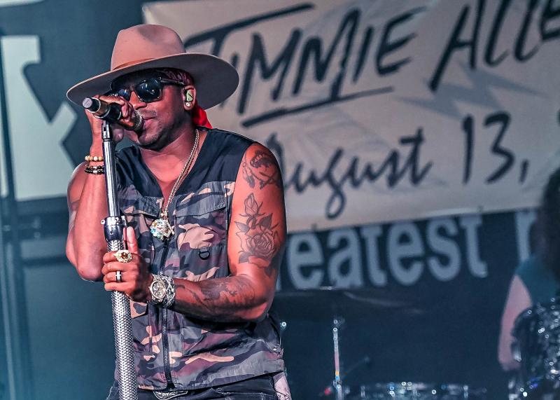 Jimmie Allen opens his concert with his hit “Make Me Want To.”