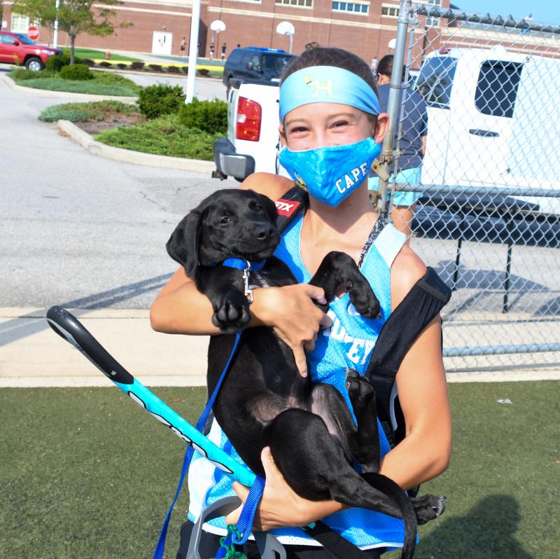 Foster Dog and freshman Cadence McMahon at open fields. DAVE FREDERICK PHOTOS