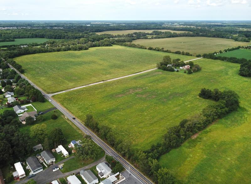 The 134-acre Tower Hill subdivision has been approved for most of the parcel covered in green along New Road, left, and Lynn Road, center, just outside Lewes city limits. NICK ROTH PHOTO
