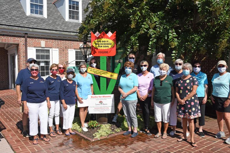 Lewes in Bloom has reached its Bucks for Blooms fundraising goal of $50,000. Shown are (l-r) Warren Golde, Marilyn Vai, Kathleen Merlo, Jane Charters, Cindy DeEmedio, Diane McGreal, Ellen McCathran, Kent Baschwitz, Betty Burleigh, Dianne Stevens, Mayor Ted Becker, Bonnie Mahr, Sue Crawford, Pat Fischer, Terry Yates and Gail Baschwitz. NICK ROTH PHOTOS